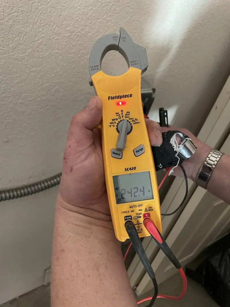 Voltage testing with clamp meter during Aluminum Wiring Replacement in Ferndale